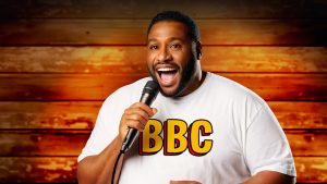 poster of a man holding a mic